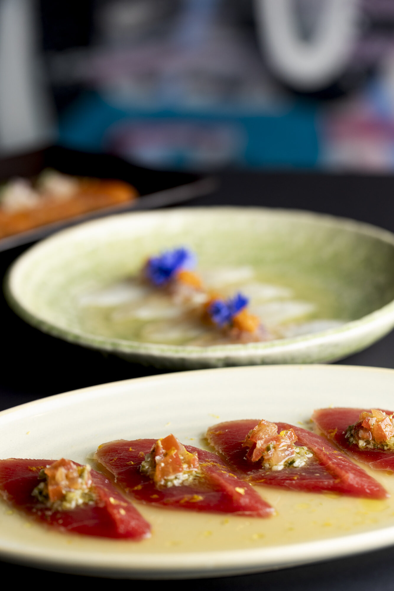 Tuna crudo with tomato and herbs
