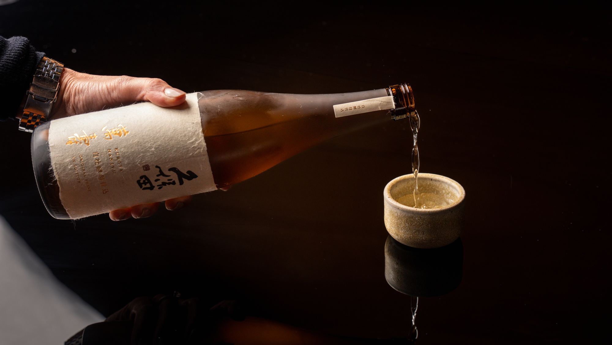 Sake poured at o ya